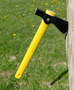 Axe with fiberglass handle sticking well in a wooden target.