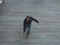 Frame 4 of the knife throwing sequence, as observed from above